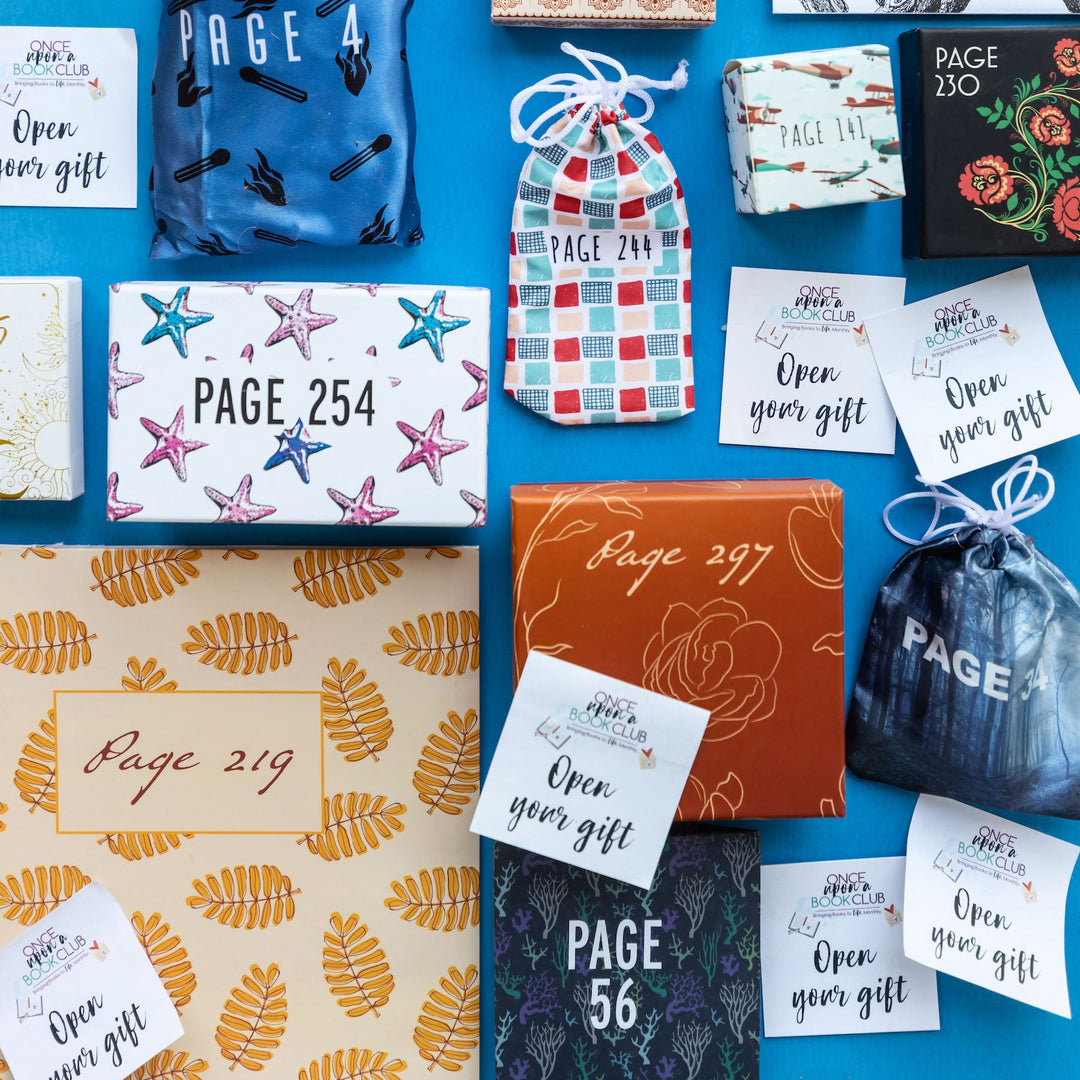 A collection of wrapped gifts with page numbers printed on them is arranged against a bright blue background, paired with "Open your gift" tags.