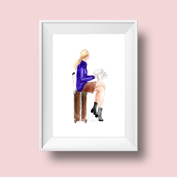 An illustration of a woman with a light skin tone and long, light blonde hair pulled back away from her face. She is wearing a blue turtleneck, brown skirt, and grey lace-up heeled booties. She sits on a rolling suitcase reading an open book.