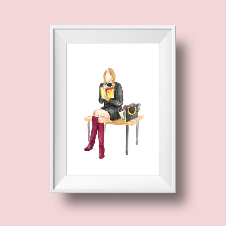 An illustration of a woman with a light skin tone and long, dark blonde hair as she sits on a bench. She wears a black long-sleeved, turtleneck dress and knee-high red boots. She has a black and white purse sitting open on the bench next to her. She is sipping a drink while holding a book open and reading.