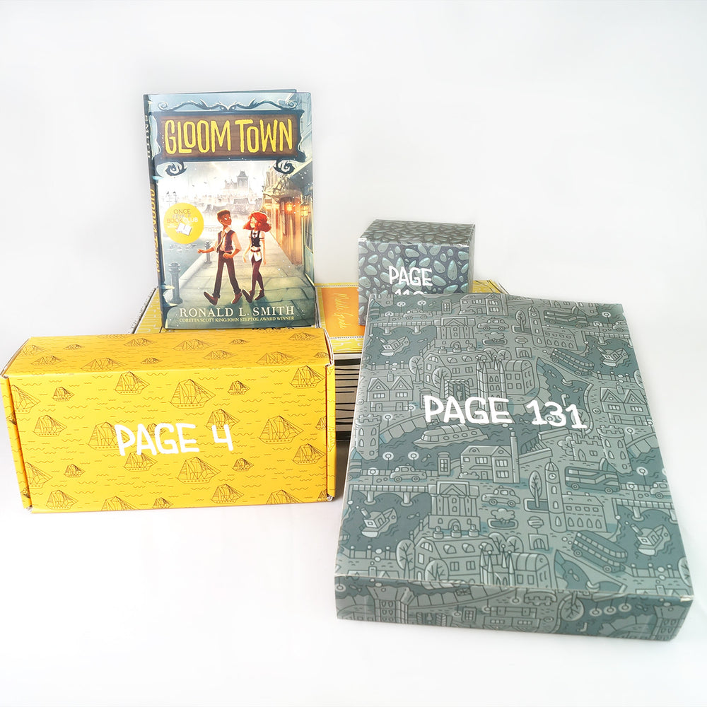 A yellow box. A hardcover book titled "Gloom Town" stands on top of it. Surrounding the book and box are 3 other boxes in shades of yellow and grey. All gift boxes are labeled with page numbers.