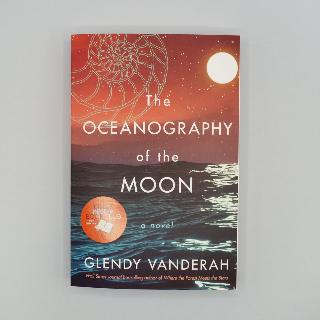 A paperback edition of The Oceanography of the Moon by Glendy Vanderah