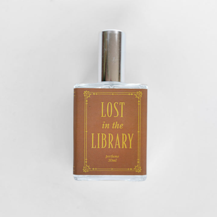A closeup of the bottle containing the fragrance "Lost in the Library".