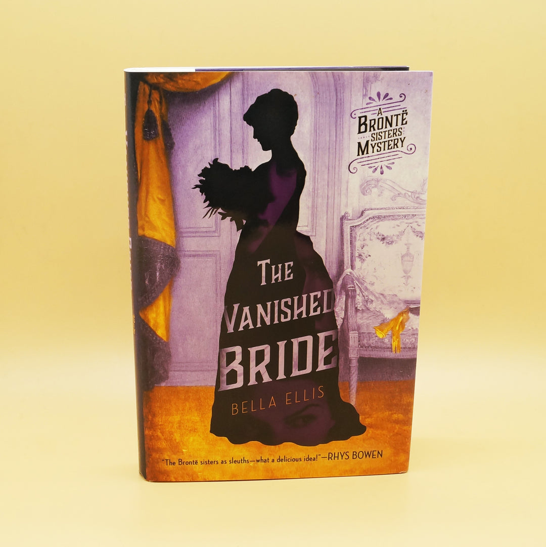 A hardcover copy of The Vanished Bride by Bella Ellis.