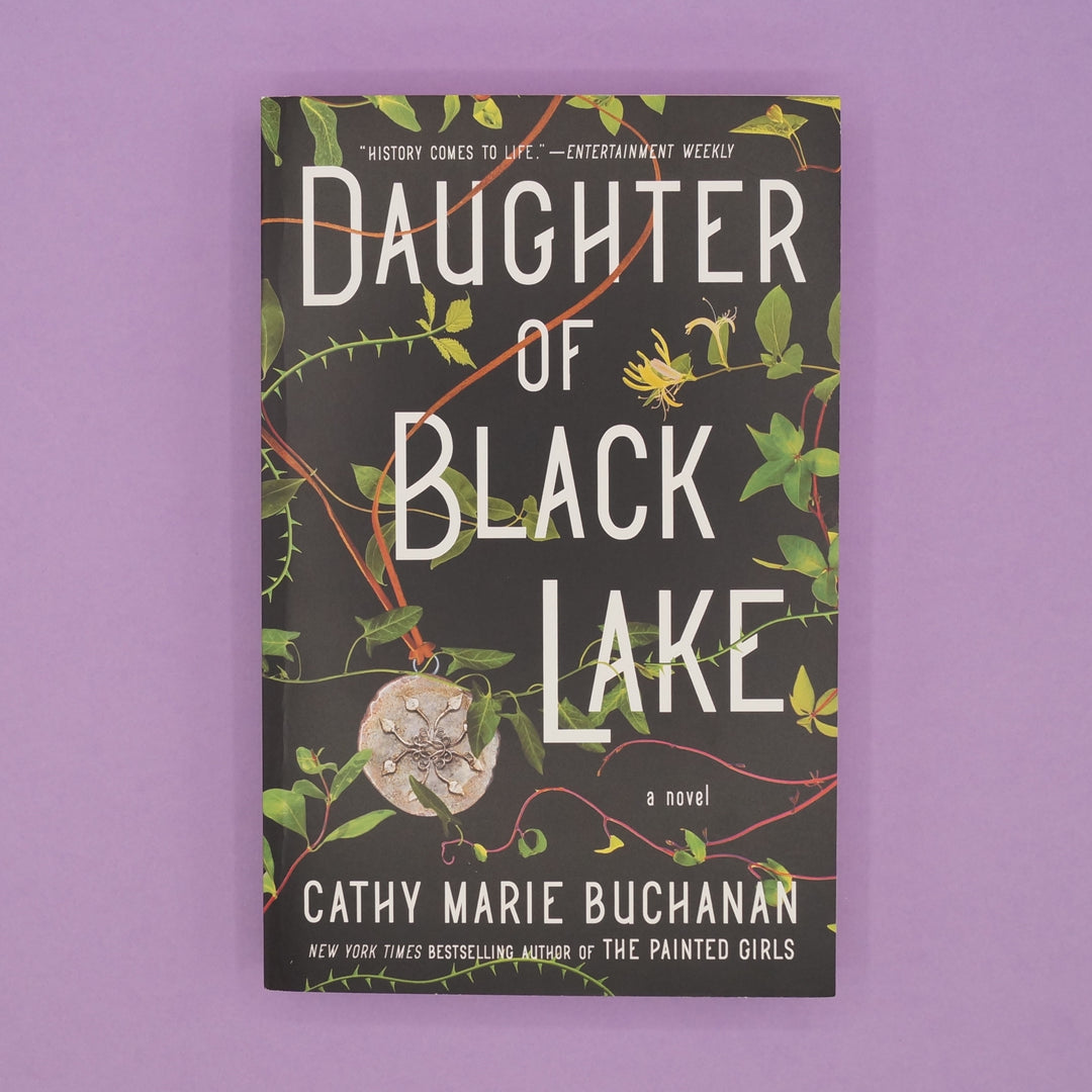 A paperback copy of Daughter of Black Lake by Cathy Marie Buchanan.