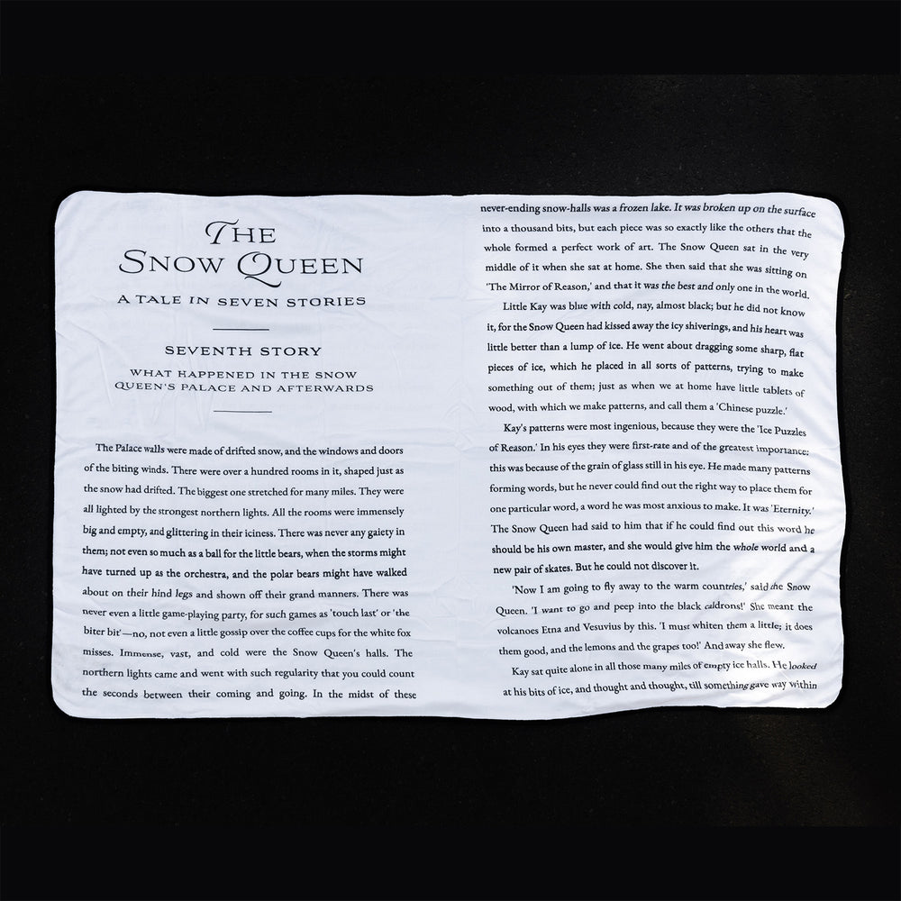 The reverse side of the Snow Queen Blanket showing the Seventh Story book pages.