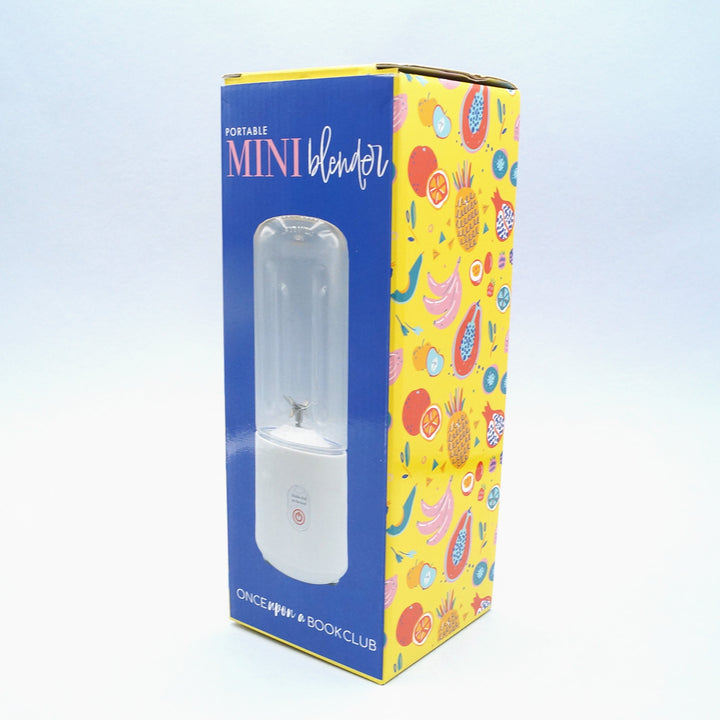 a blue and yellow box labeled portable mini blender