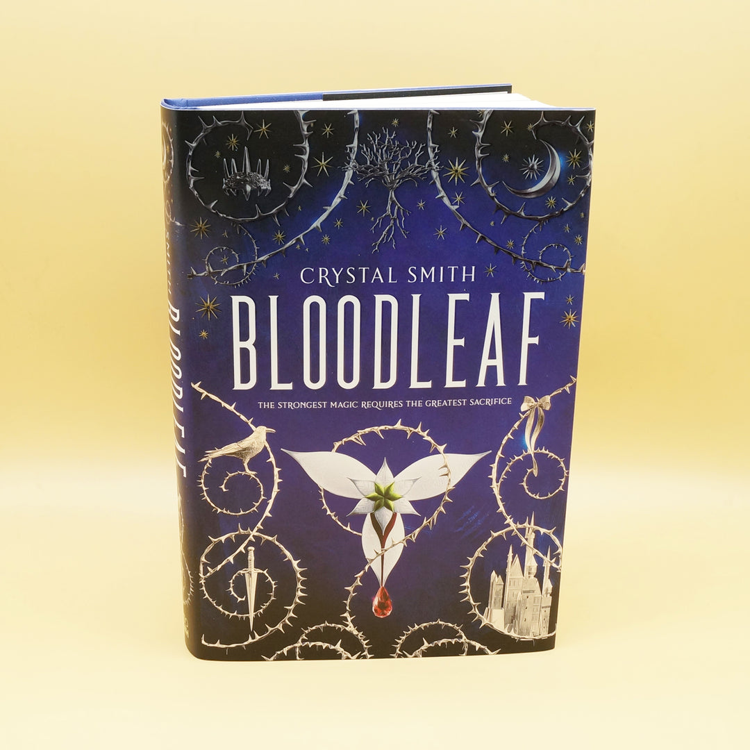 A hardcover copy of Bloodleaf by Crystal Smith.