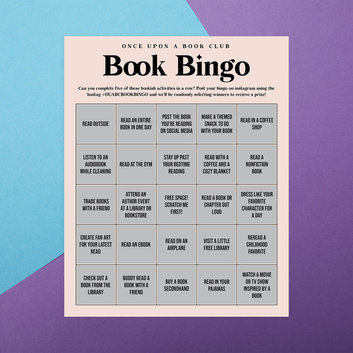a 5x5 pale pink book bingo card is against a background of purple and blue