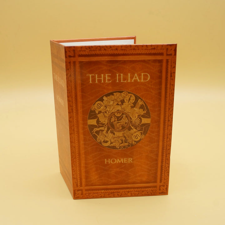 a fan shaped like the book The Iliad sits against a yellow background 