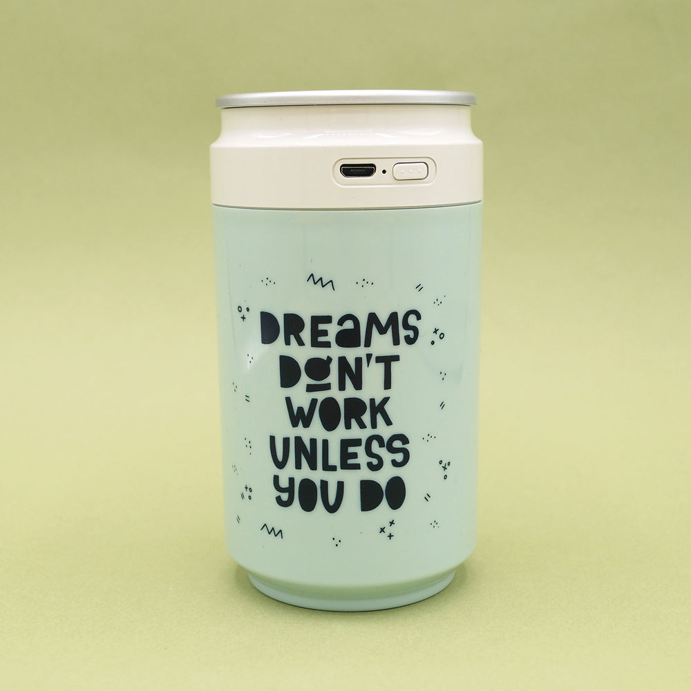 A soda-can shaped essential oil diffuser that says Dreams Don't Work Unless You Do.