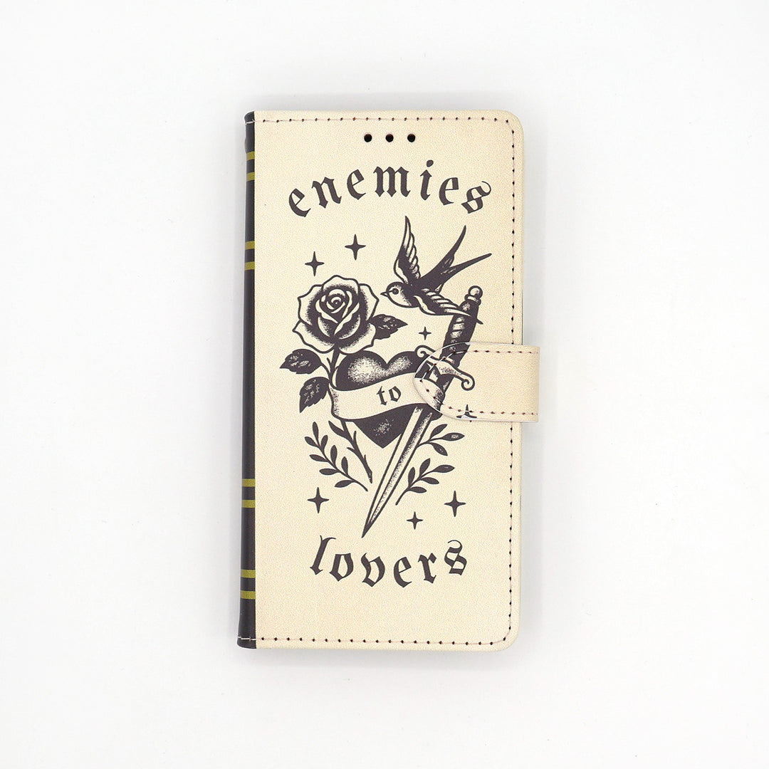 Phone case with tattoo-style design featuring a rose, dagger, and text on a white background