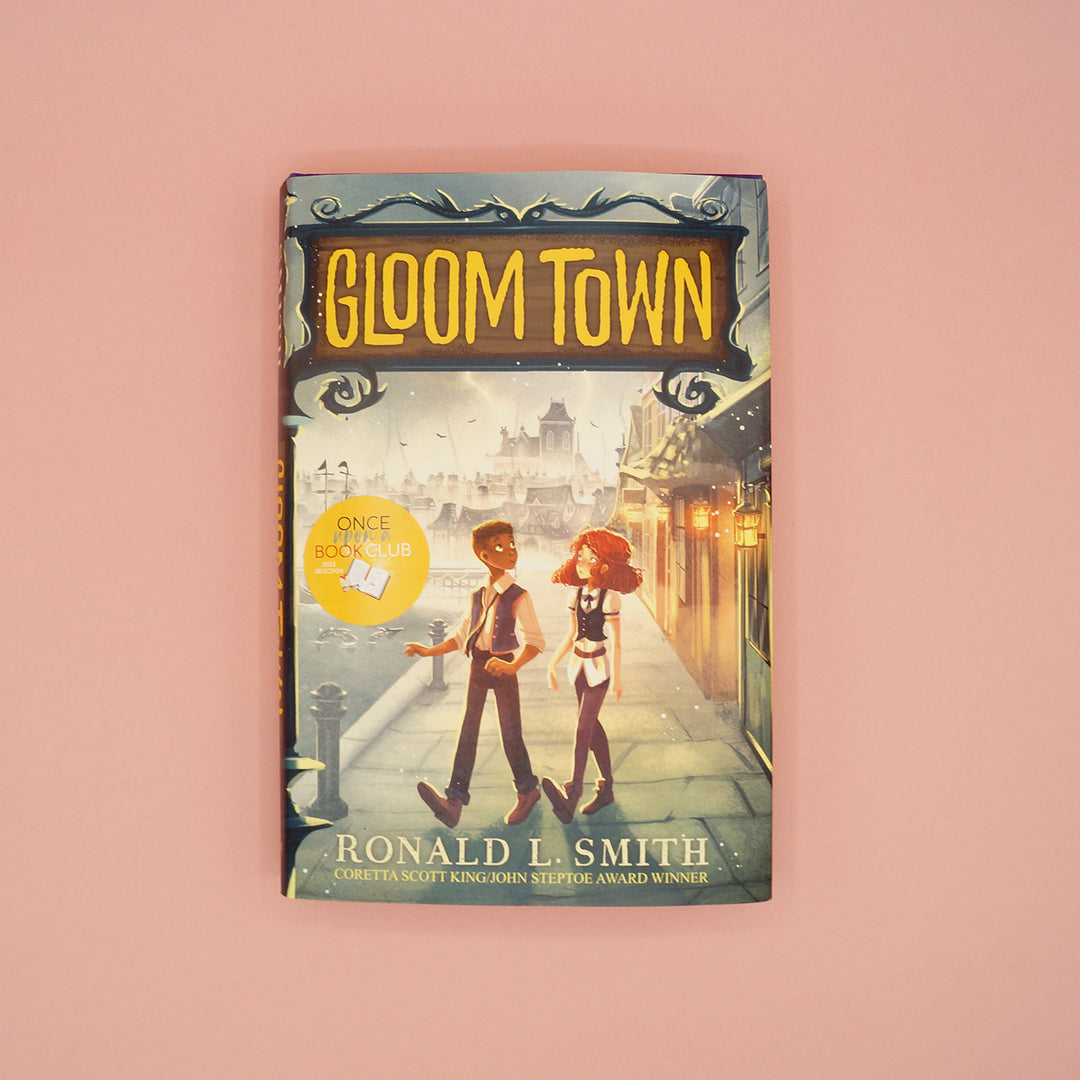 A hardcover copy of Gloom Town by Ronald L. Smith.