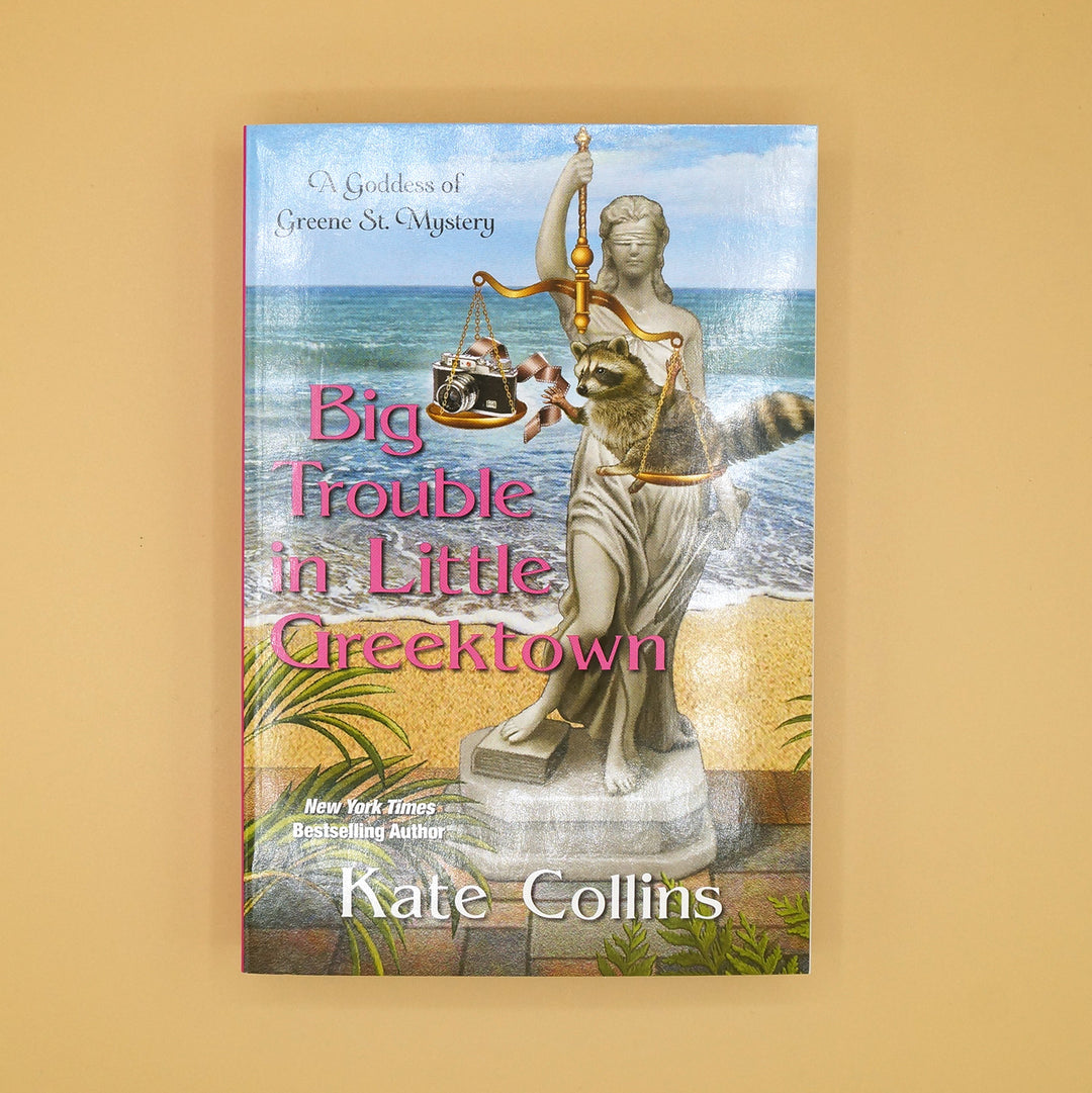 a paperback edition of Big Trouble in Little Greektown by Kate Collins
