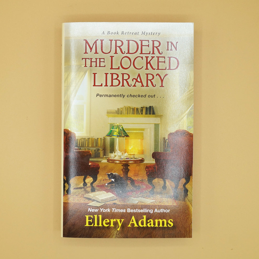 a paperback edition of Murder in the Locked Library by Ellery Adams