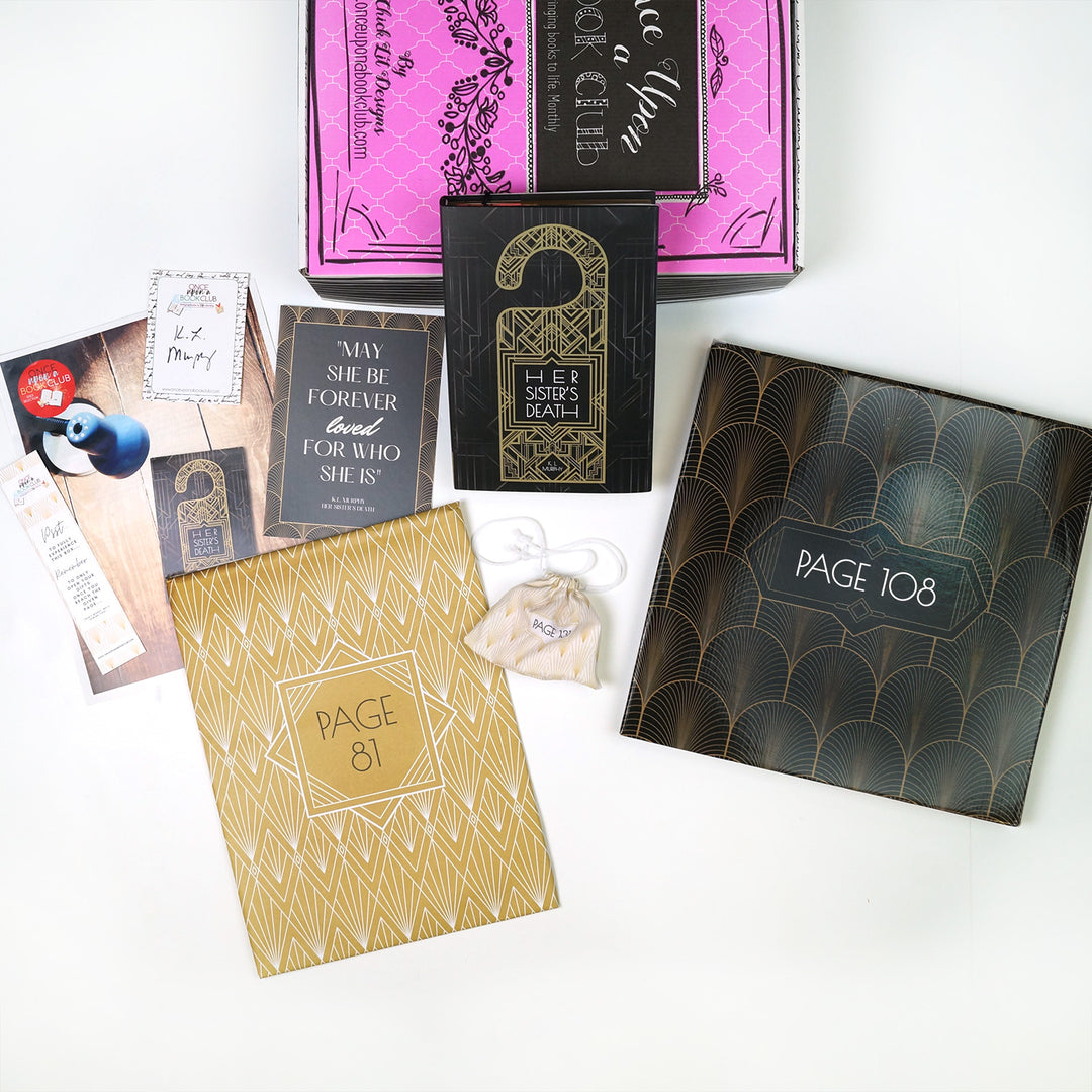 a hardcover special edition of Her Sister's Death leans against a pink Once Upon a Book Club box. In front of the book (from left to right) are a bookmark, bookclub kit, signature card, quote card, gold folder, white drawstring bag, and black box. The boxes and folder all have page numbers.