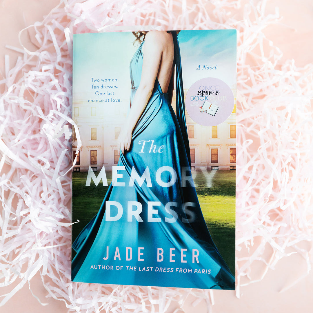 Book cover of 'The Memory Dress' by Jade Beer on a textured pink background