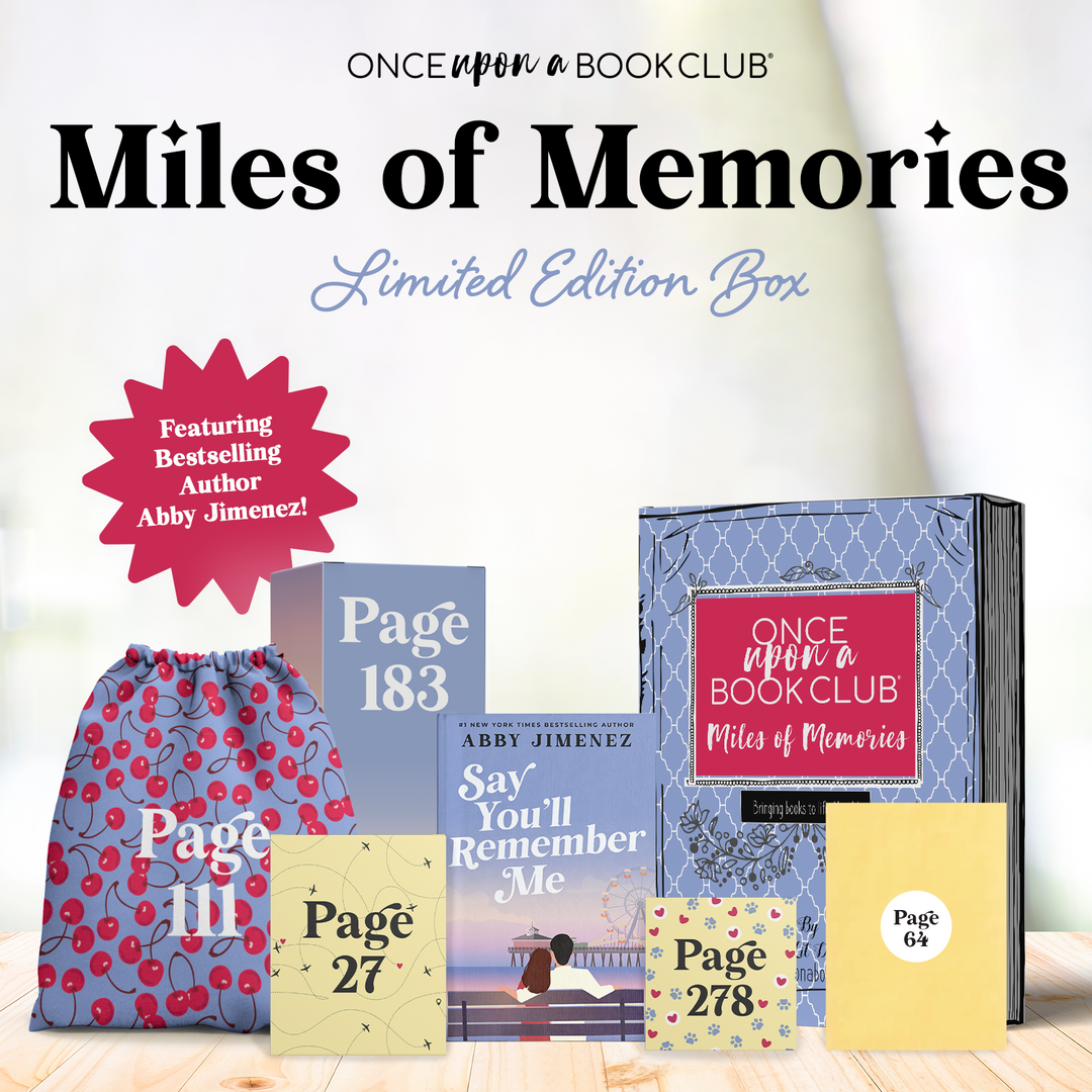 A hardcover, exclusive edition of "Say You'll Remember Me" by Abby Jimenez stands next to a purple "Miles of Memories" box surrounded by wrapped gifts labeled with page numbers.