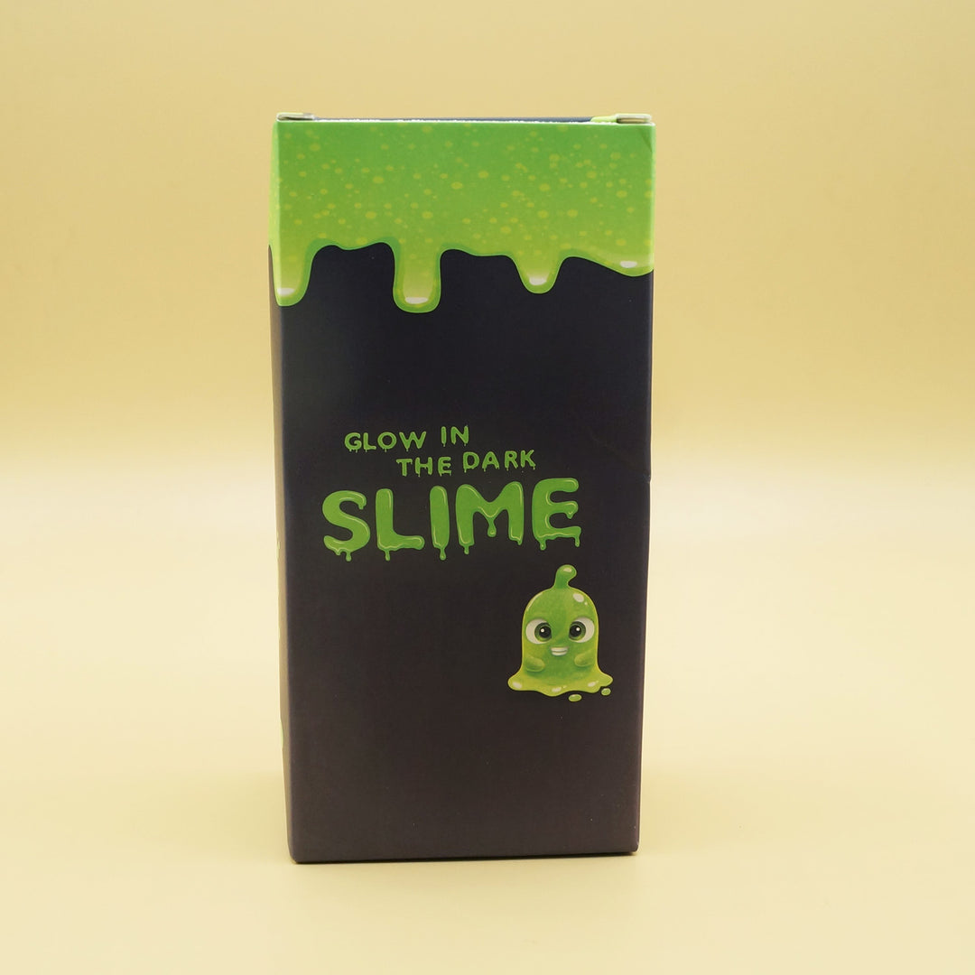a black box with green slime on it, labeled Glow in the Dark Slime