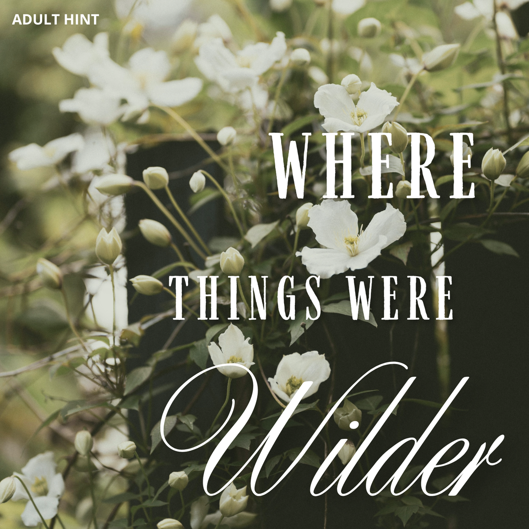 White flowers with text overlay 'Where Things Were Wilder' on a blurred natural background. The words "Adult Hint" are in the upper left corner.