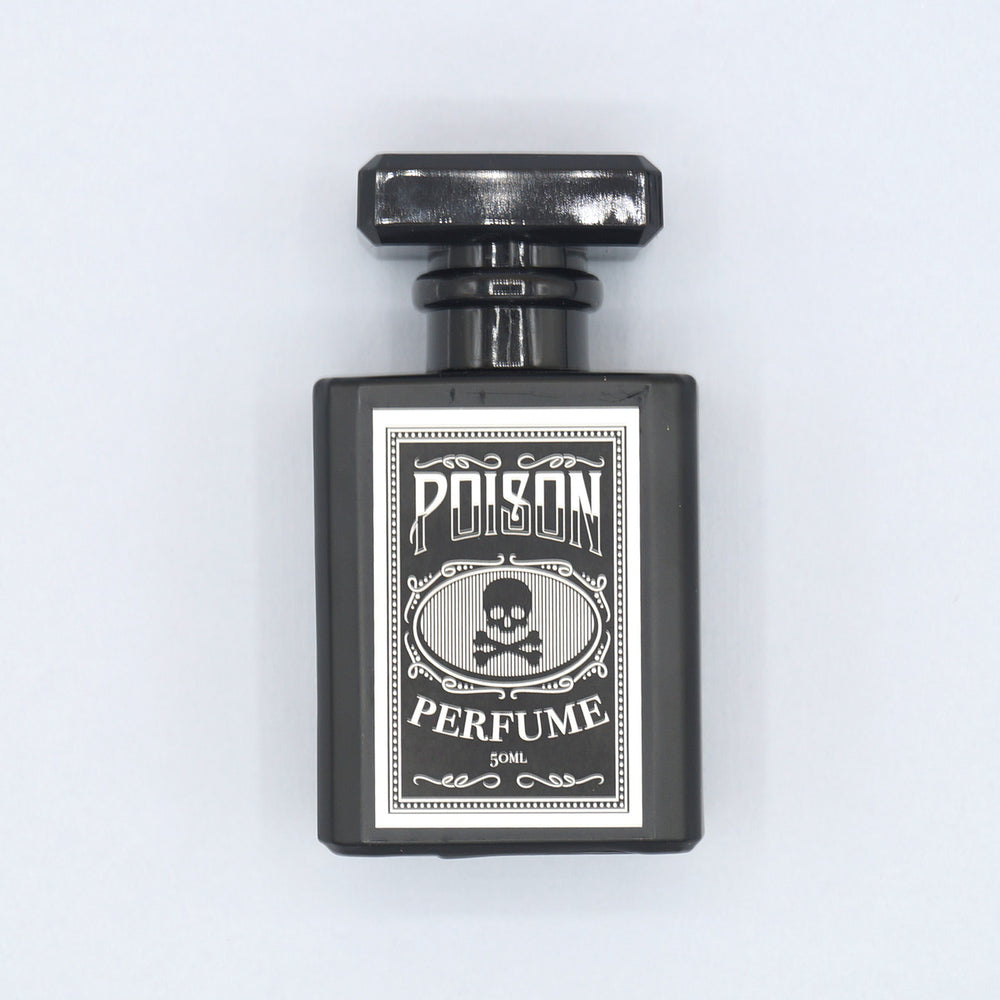 a black perfume bottle labeled Poison Perfume 50ml with an image of a skull in the middle