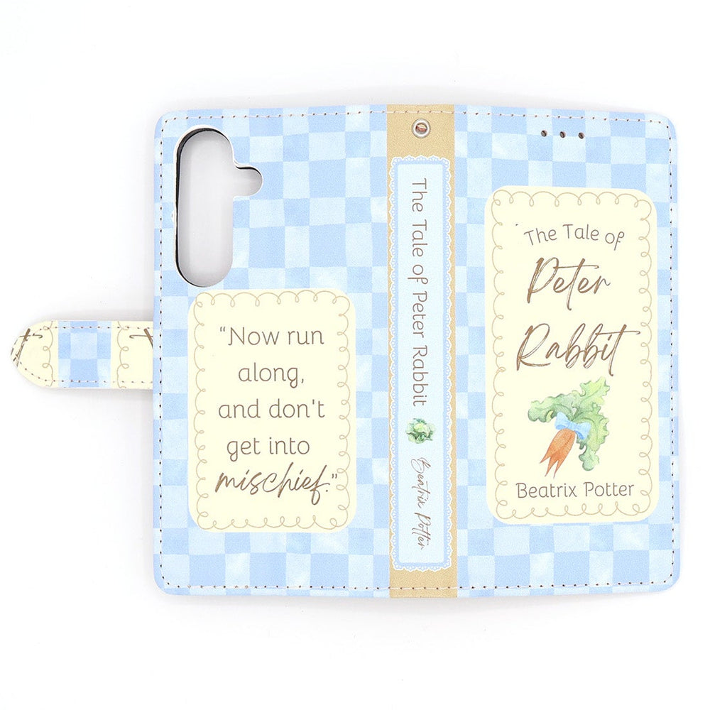 Phone case with checkered pattern and 'The Tale of Peter Rabbit' design on a white background