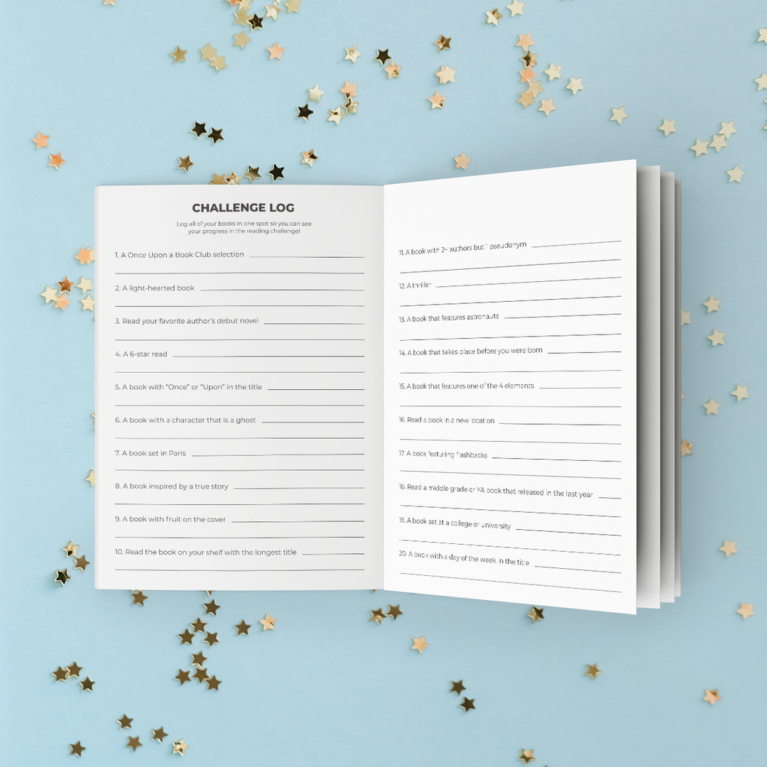 An open sneak peek of the Reading Challenge booklet index with lined writing areas and prompts, photographed on a light blue background with scattered gold star confetti.