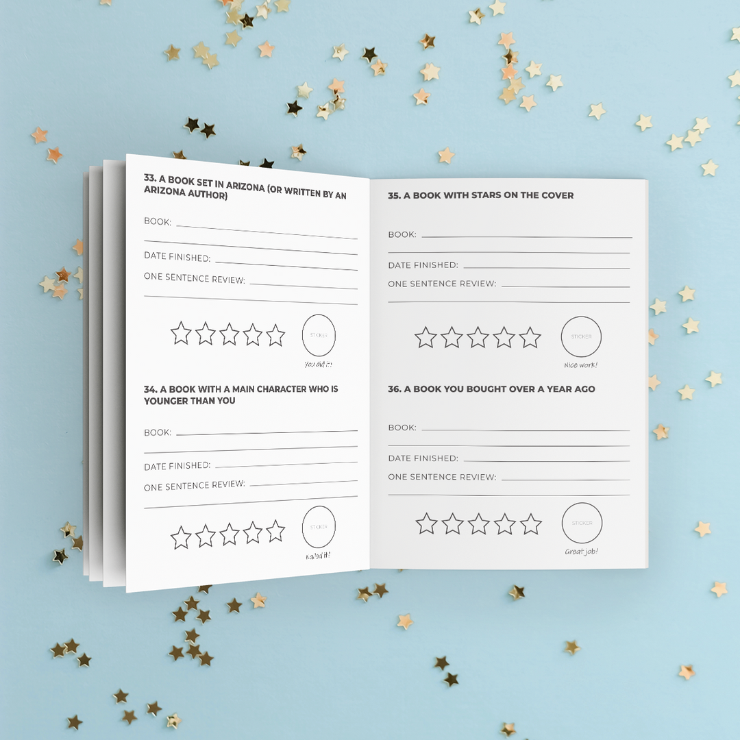 An open sneak peek of some of the challenges inside this year's Reading Challenge booklet including printed review prompts and star rating circles, photographed on a light blue background with scattered gold star confetti. 