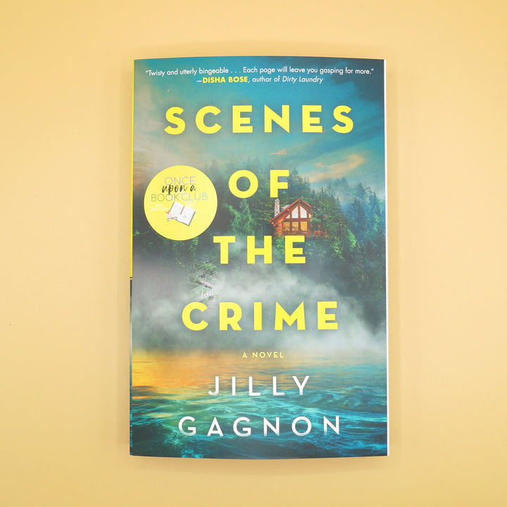 A paperback copy of Scenes of the Crime sits on a yellow background