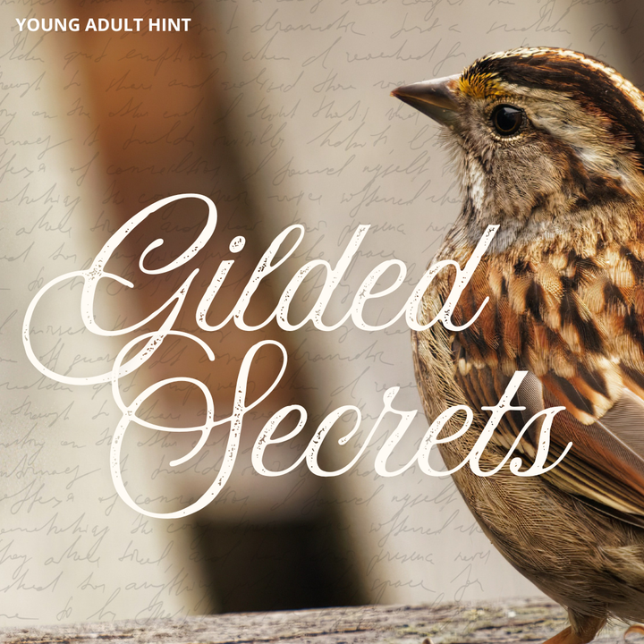 The September Young Adult hint image featuring a close-up photograph of a brown sparrow perched on a wooden surface, with large white script text reading 'Gilded Secrets' and smaller text 'YOUNG ADULT HINT' in the upper left. The background is softly blurred with warm neutral tones and faint cursive writing.