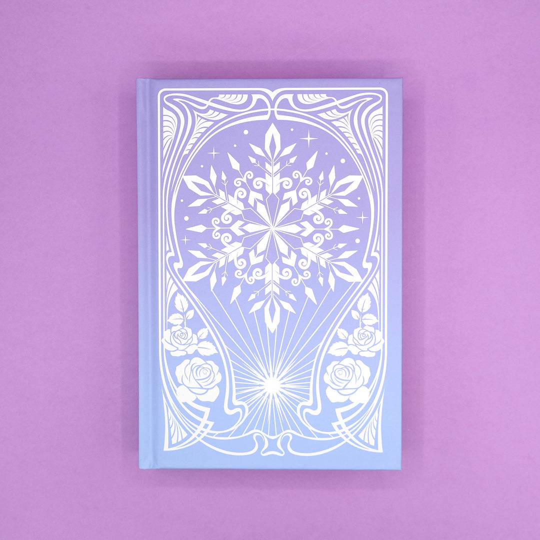 The hard case of 'The Sun and the Starmaker' by Rachel Griffin showcasing an intricate, winter design on a purple background.