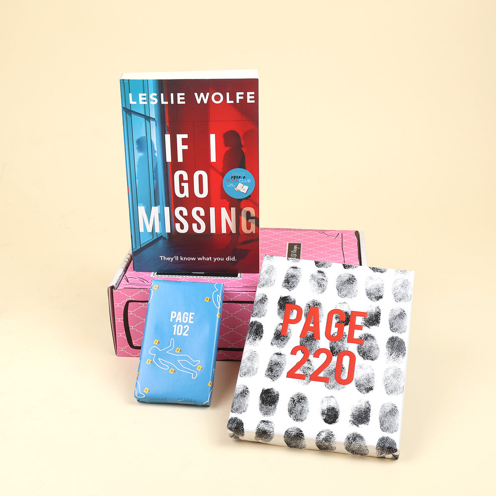 The Thriller Mini box items featuring the book 'If I Go Missing' by Leslie Wolfe, a pink hardcover edition, a blue wrapped gift labeled 'PAGE 102', and a white gift wrapped with a black fingerprint pattern and red text reading 'PAGE 220', arranged on a beige background.