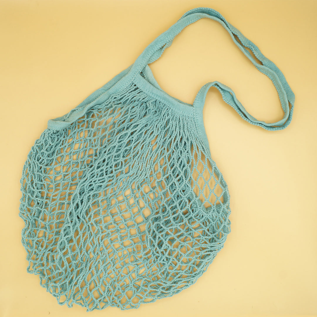 a teal woven produce bag