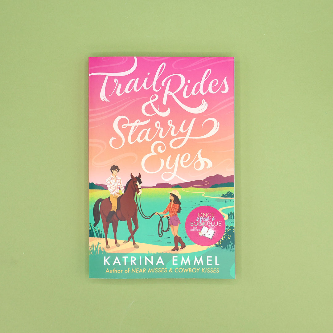 Book cover of 'Trail Rides & Starry Eyes' by Katrina Emmel on a green background