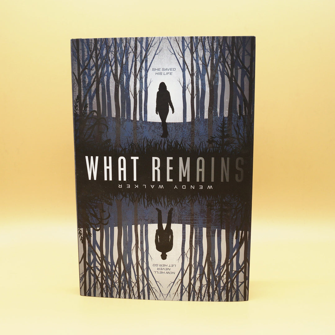 the front dust-jacket of a hardcover copy of What Remains
