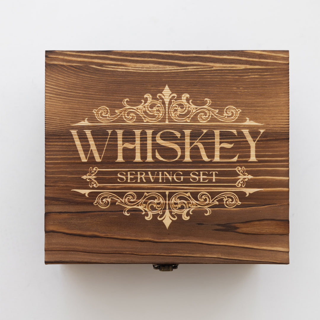 a wooden box labeled Whiskey Serving Set