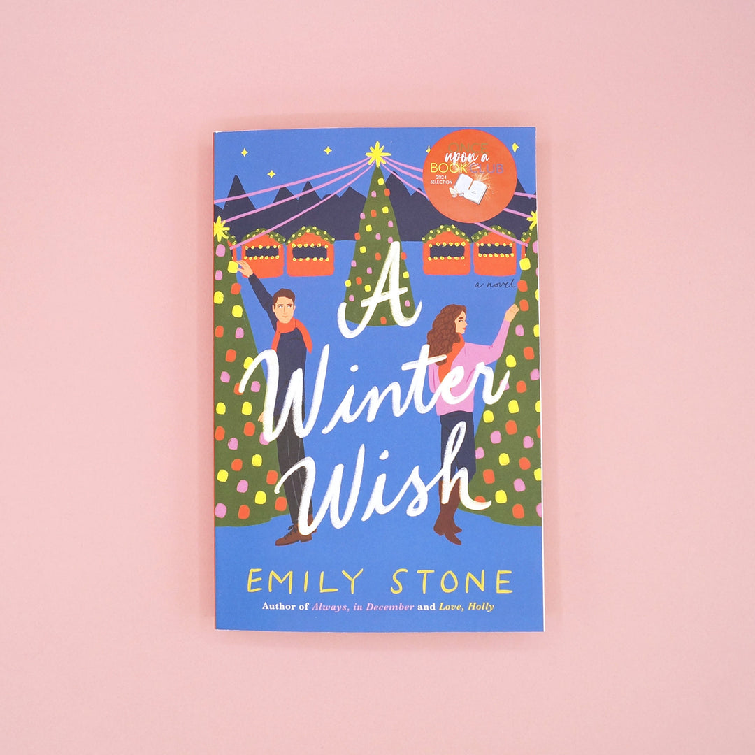 Book cover of 'A Winter Wish' by Emily Stone on a pink background