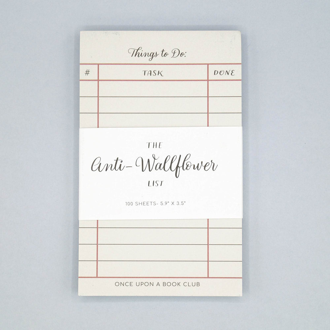 a white notepad labeled Things to Do with a white label across the center that says The Anti-Wallflower List