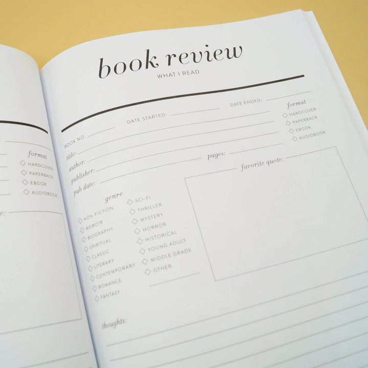 a reading journal open to a page titled "Book Review - What I Read" with sections to fill out below