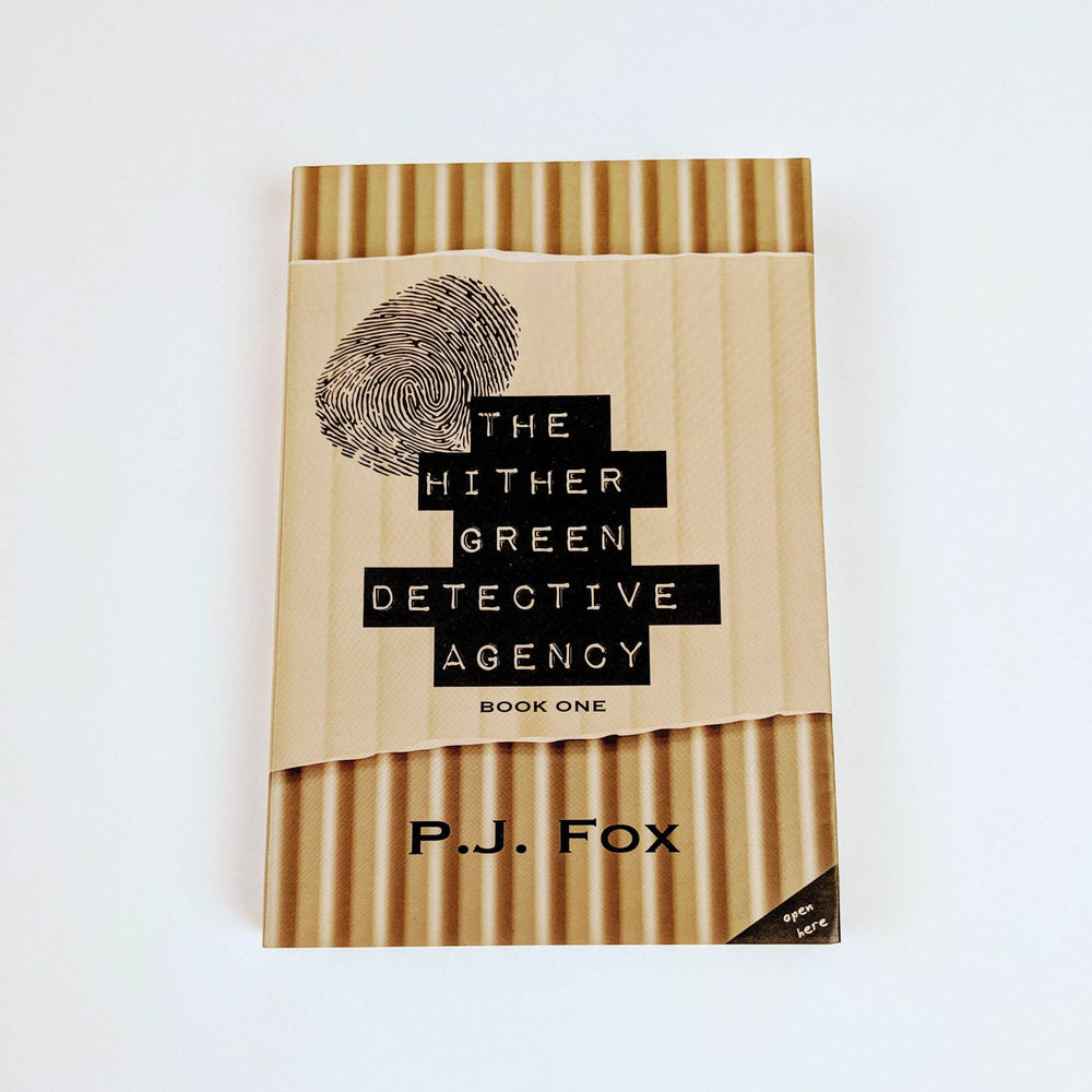 Book titled The Hither Green Detective Agency Book One by PJ Fox, with a fingerprint on the cover.