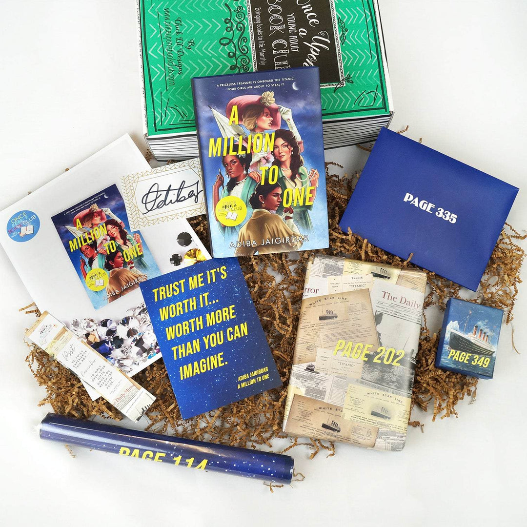 A hardcover edition of A Million to One leans against a green Once Upon a Book Club box. In front of the box are a bookclub kit, signature card, bookmark, quote card, blue tube, blue envelope, small square box with an image of the Titanic, and a box with a pattern of newspaper articles. The boxes and envelope are labeled with page numbers.
