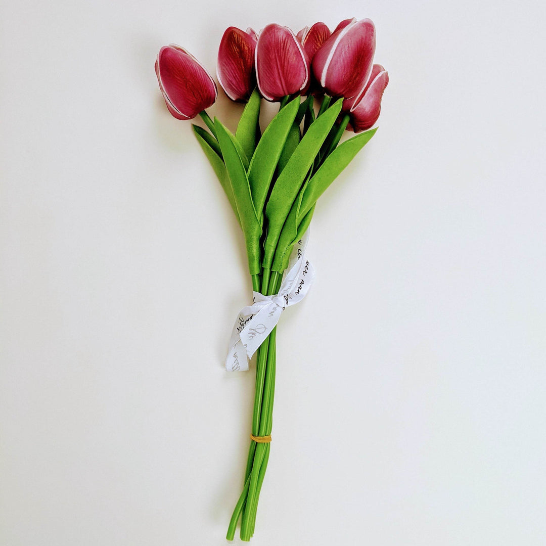 a bouquet of fake pink tulips