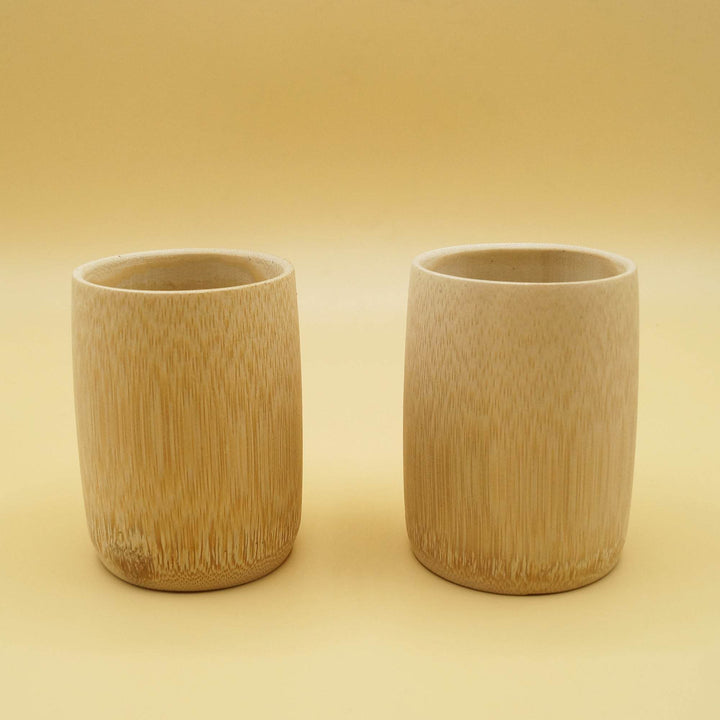 a pair of wooden cups