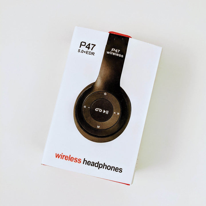 a white box labeled P47 wireless headphones, headphones are black