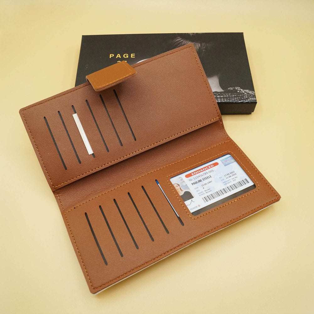 a brown open wallet with an ID card in it