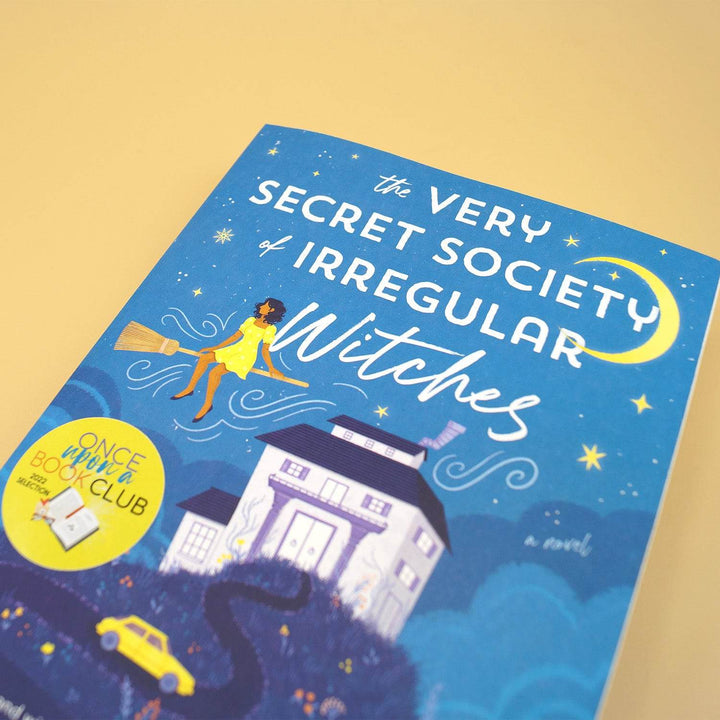 a paperback edition of The Very Secret Society of Irregular Witches