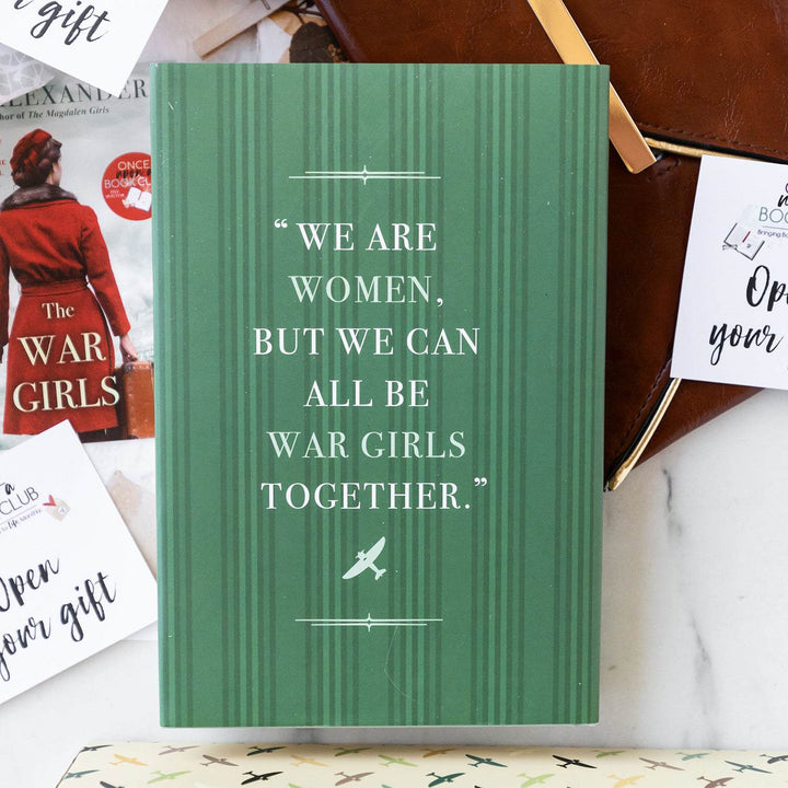 a back of a hardcover special edition of The War Girls. The back cover is green with a quote in white: "We are women, but we can all be war girls together."