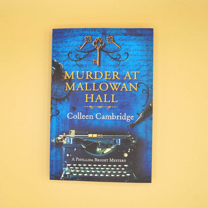 paperback edition of Murder at Mallowan Hall by Colleen Cambridge